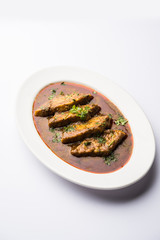 Patodi Rassa Bhaji or patwadi Sabji, a popular Maharashtrian spicy recipe served with Chapati and salad. Selective focus