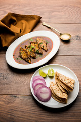 Patodi Rassa Bhaji or patwadi Sabji, a popular Maharashtrian spicy recipe served with Chapati and salad. Selective focus