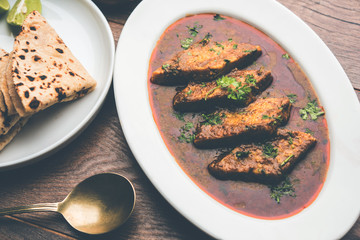 Patodi Rassa Bhaji or patwadi Sabji, a popular Maharashtrian spicy recipe served with Chapati and salad. Selective focus