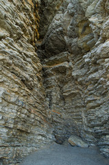 Rock, the background of the layers of ancient sediments.