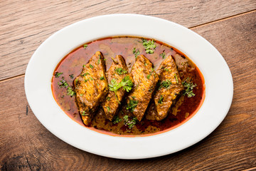 Patodi Rassa Bhaji or patwadi Sabji, a popular Maharashtrian spicy recipe served with Chapati and salad. Selective focus