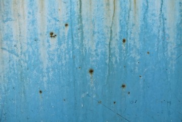 rust on old blue wall background