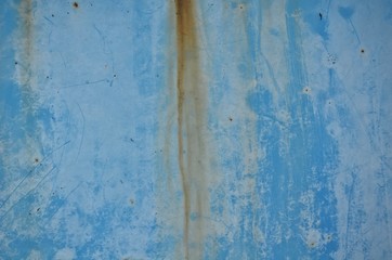 rust on old blue wall background