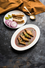 Patodi Rassa Bhaji or patwadi Sabji, a popular Maharashtrian spicy recipe served with Chapati and salad. Selective focus