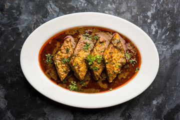 Patodi Rassa Bhaji or patwadi Sabji, a popular Maharashtrian spicy recipe served with Chapati and salad. Selective focus