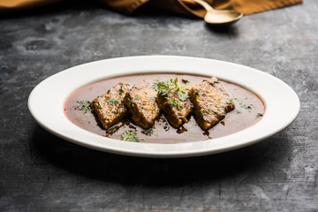 Patodi Rassa Bhaji or patwadi Sabji, a popular Maharashtrian spicy recipe served with Chapati and salad. Selective focus