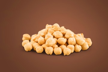 Heap of preserved chickpeas isolated on white background