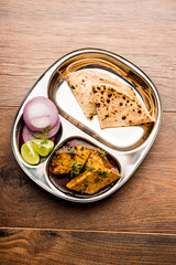 Patodi Rassa Bhaji or patwadi Sabji, a popular Maharashtrian spicy recipe served with Chapati and salad. Selective focus