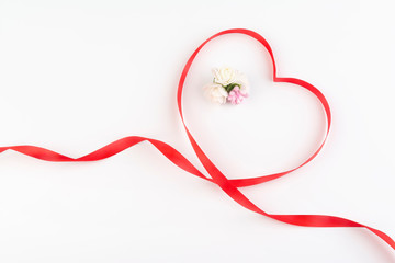 Ribbons shaped as hearts on white, valentines day concept