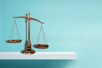 Law scales on table background. Symbol of justice