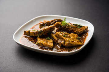 Patodi Rassa Bhaji or patwadi Sabji, a popular Maharashtrian spicy recipe served with Chapati and salad. Selective focus