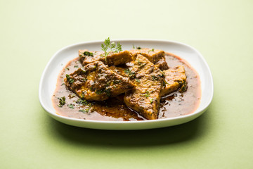 Patodi Rassa Bhaji or patwadi Sabji, a popular Maharashtrian spicy recipe served with Chapati and salad. Selective focus