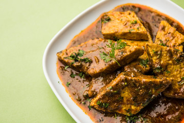 Patodi Rassa Bhaji or patwadi Sabji, a popular Maharashtrian spicy recipe served with Chapati and salad. Selective focus
