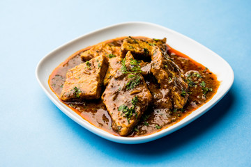 Patodi Rassa Bhaji or patwadi Sabji, a popular Maharashtrian spicy recipe served with Chapati and salad. Selective focus