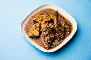Patodi Rassa Bhaji or patwadi Sabji, a popular Maharashtrian spicy recipe served with Chapati and salad. Selective focus