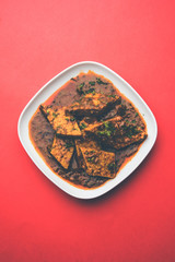Patodi Rassa Bhaji or patwadi Sabji, a popular Maharashtrian spicy recipe served with Chapati and salad. Selective focus