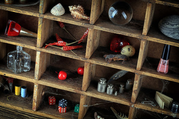 Wooden box catalog with cobwebs and various little things