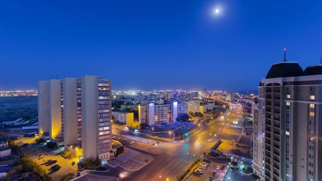 Aktau city after sunset on the shore of the Caspian Sea day to night timelapse. Kazakhstan.