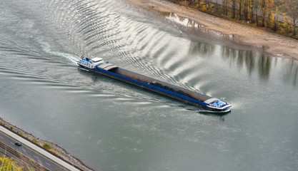  Coal freighter with reduced shipload on river Rhine with low water level, caused by drought 2018,...