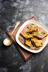 Patodi Rassa Bhaji or patwadi Sabji, a popular Maharashtrian spicy recipe served with Chapati and salad. Selective focus