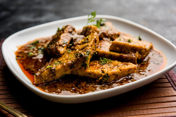 Patodi Rassa Bhaji or patwadi Sabji, a popular Maharashtrian spicy recipe served with Chapati and salad. Selective focus