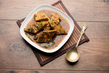 Patodi Rassa Bhaji or patwadi Sabji, a popular Maharashtrian spicy recipe served with Chapati and salad. Selective focus