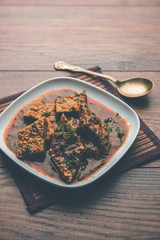 Patodi Rassa Bhaji or patwadi Sabji, a popular Maharashtrian spicy recipe served with Chapati and salad. Selective focus