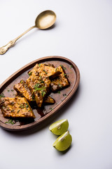 Patodi Rassa Bhaji or patwadi Sabji, a popular Maharashtrian spicy recipe served with Chapati and salad. Selective focus