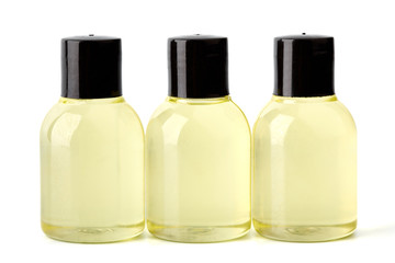 Shampoo and shower gel on a white background. Hotel cosmetic bottles isolated on white. Mini bottle set