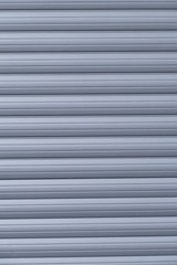 Fototapeta premium heruntergezogener grauer Rolladen