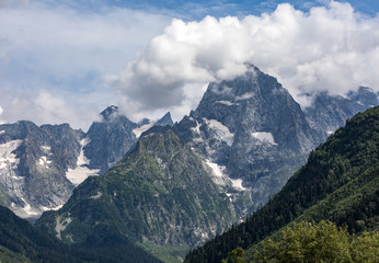 Fototapeta premium The view of the mountains of Dombai. The Caucasus - Russia