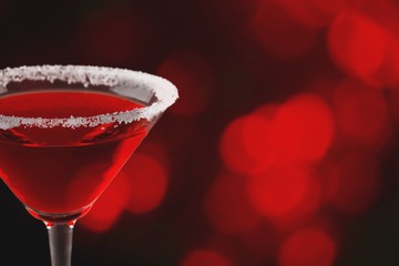 Glass of alcohol  cocktail on background