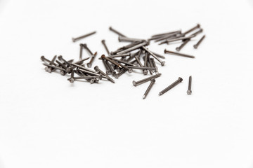 Set of metal nails on the white background