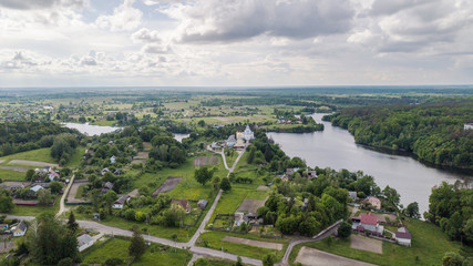 Fototapeta premium Aerial view of a small river with church