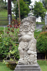 Fototapeta na wymiar Painted statue at Tirta Gangga water palace, Bali, Indonesia