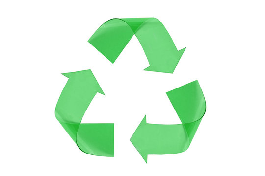 Recyclig symbol made of green plastic on white background