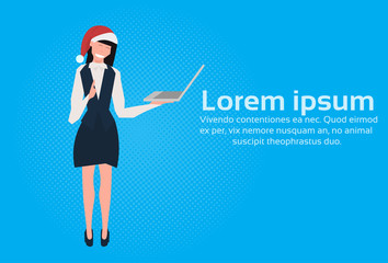 businesswoman wearing santa red hat using laptop female cartoon character full length blue background flat horizontal copy space vector illustration