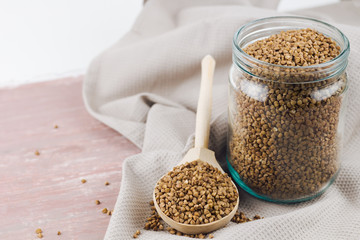 jar with uncooked buckwheat