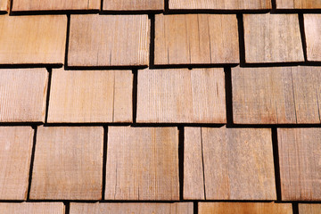 Naklejka premium Colored wooden wall of many pieces of wood