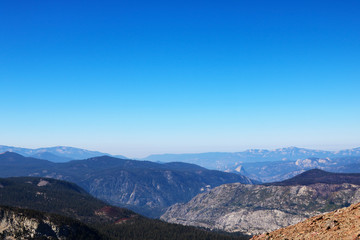 Obraz premium View of the mountain tops against the blue sky