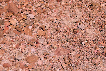 view of bright red earth, background, texture.