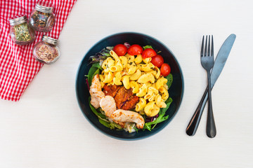 Caesar salad and Roasted Chicken of Italian Cheese tomatoes