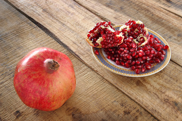 pomegranate on wooden table