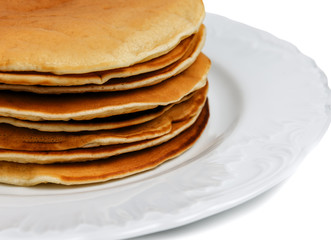 stack of fresh pancakes on white