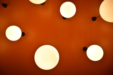 low angle circle lamp with orange background