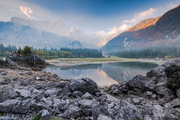 Sunrise and fog at Fusine Lake, Italy