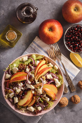 Apple salad with walnuts, pomegranate amd goat cheese.
