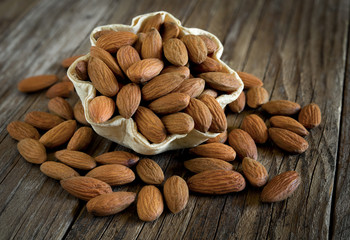 almonds peeled on table