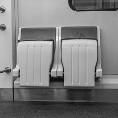 subway car without people, empty passengers, seats