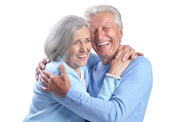 Portrait of happy senior couple on white background